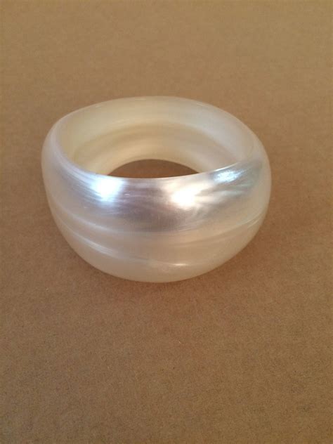 fake lucite chanel bracelet with large pearl